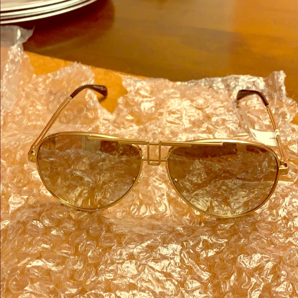 Givenchy Sunglasses. Unisex